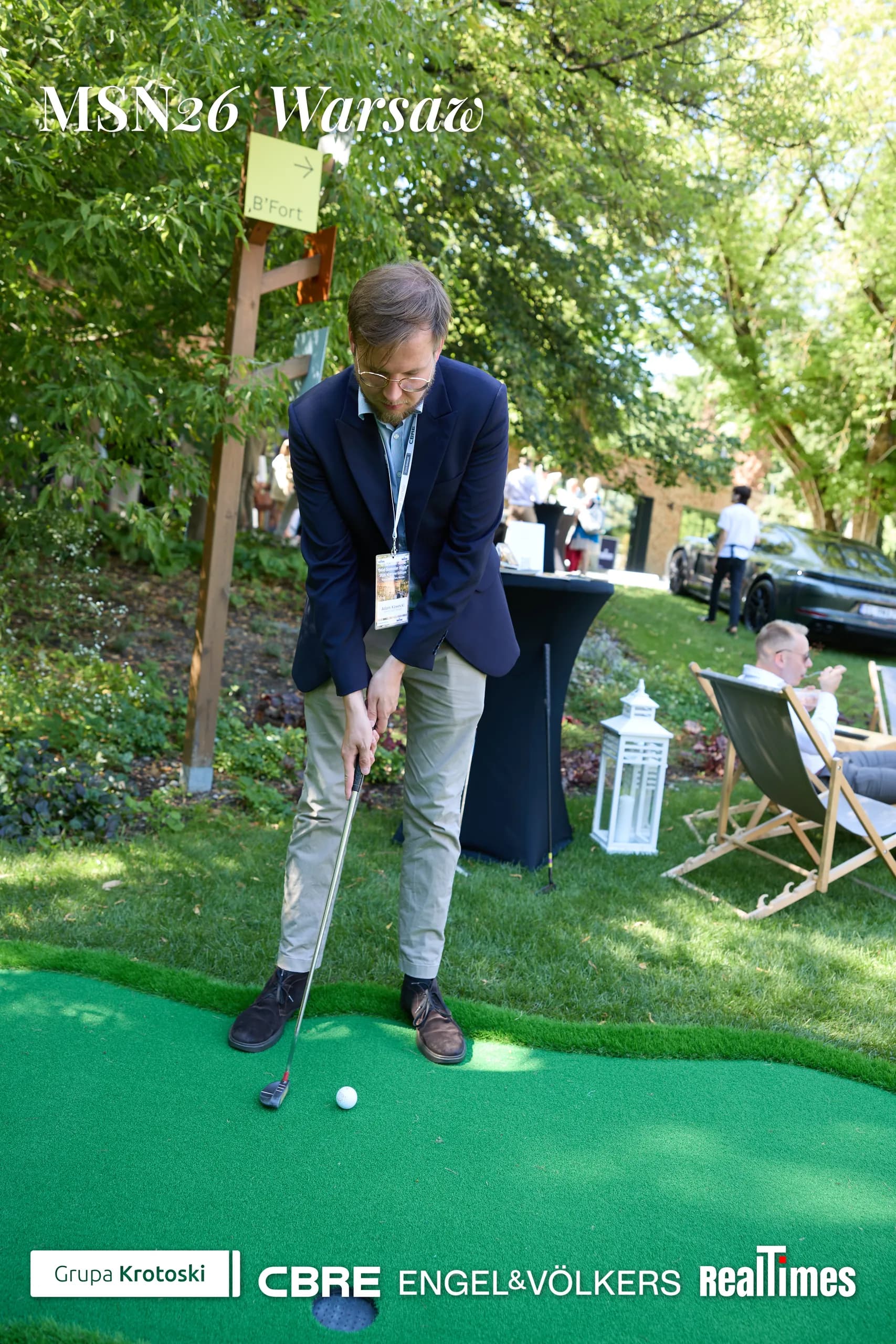 Mid-Summer Night 2026 at B'Fort, Warsaw: man putting on mini-golf activation