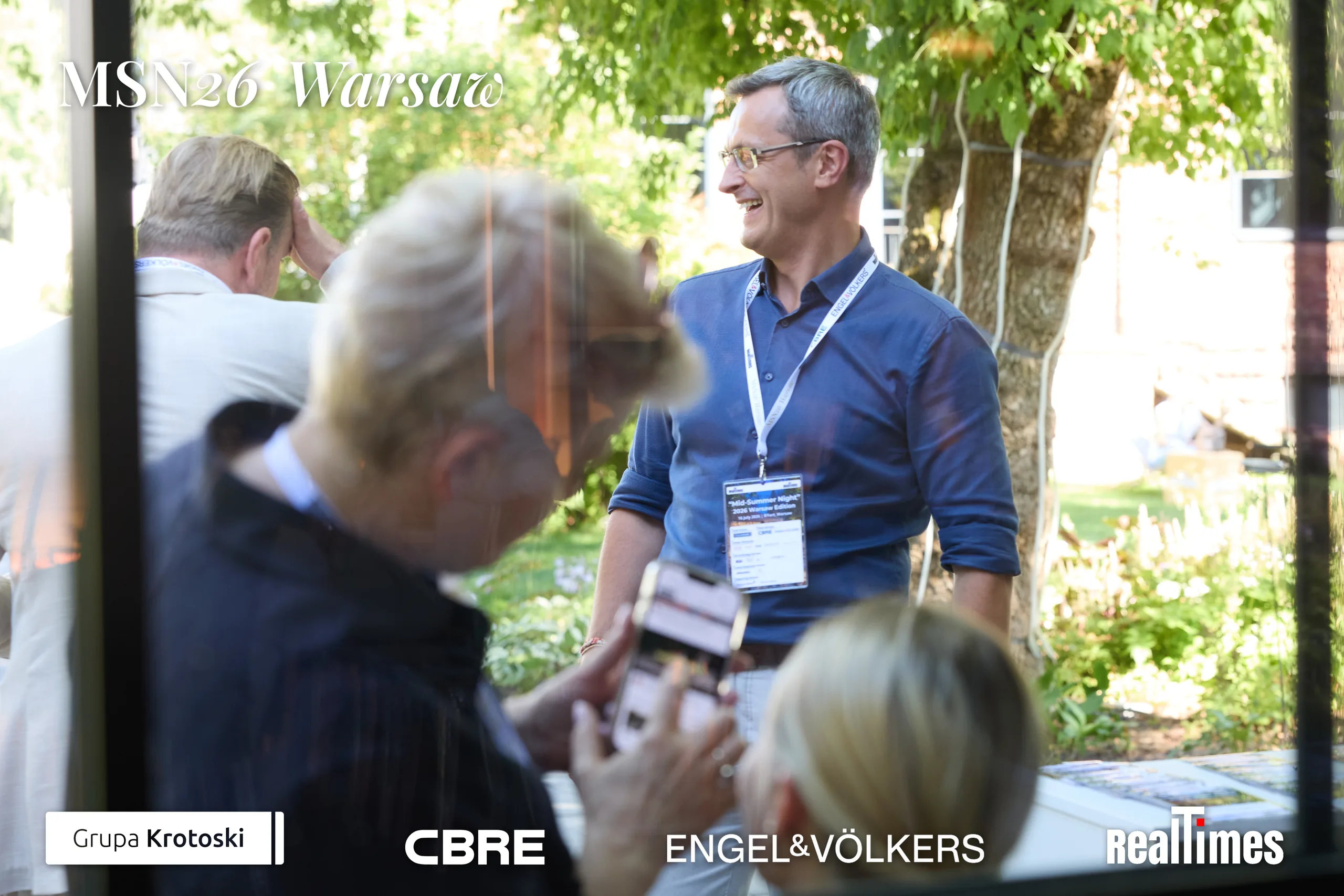 Mid-Summer Night 2026 at B'Fort, Warsaw: garden networking, man smiling