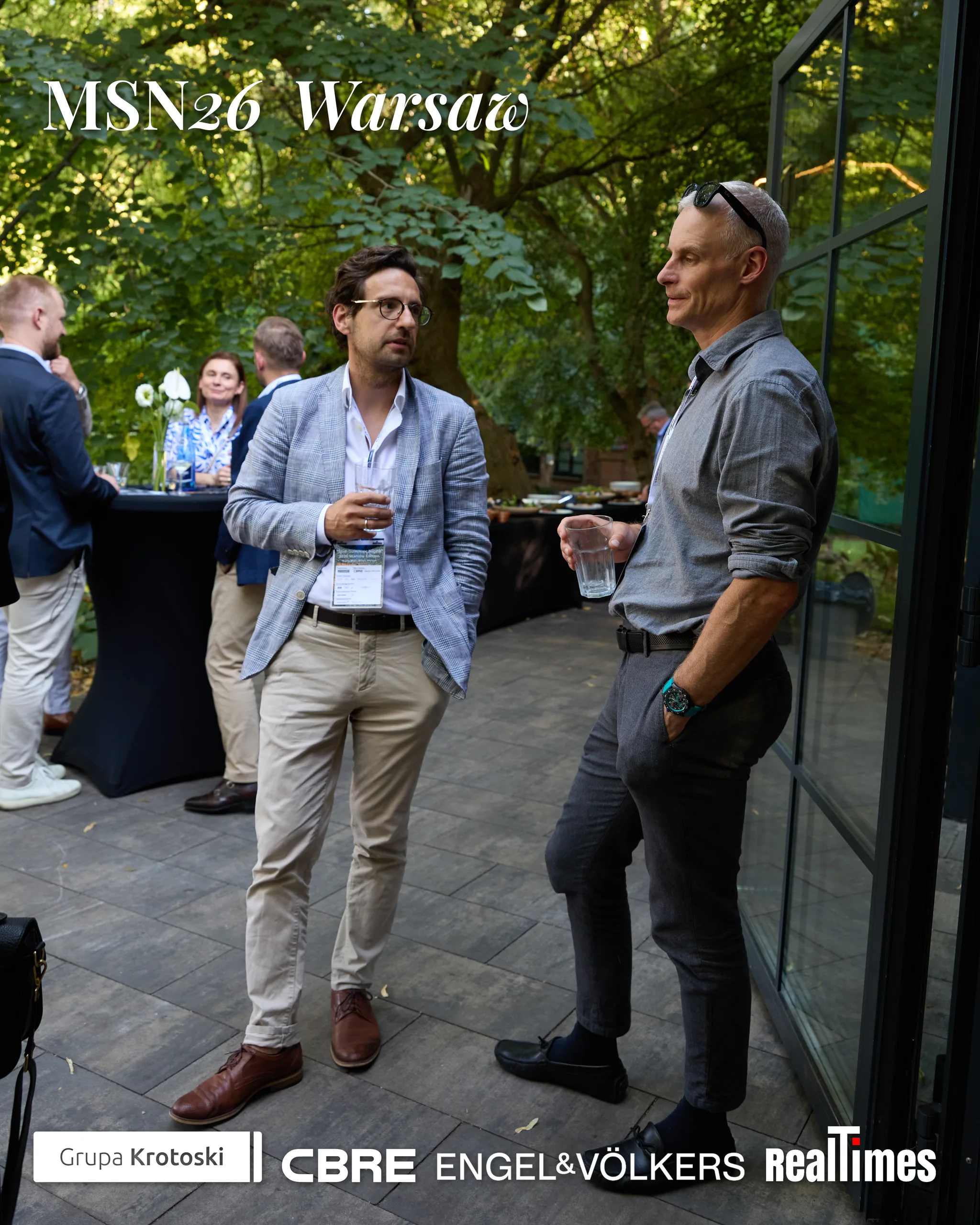Mid-Summer Night 2026 at B'Fort, Warsaw: two men chatting with drinks on terrace