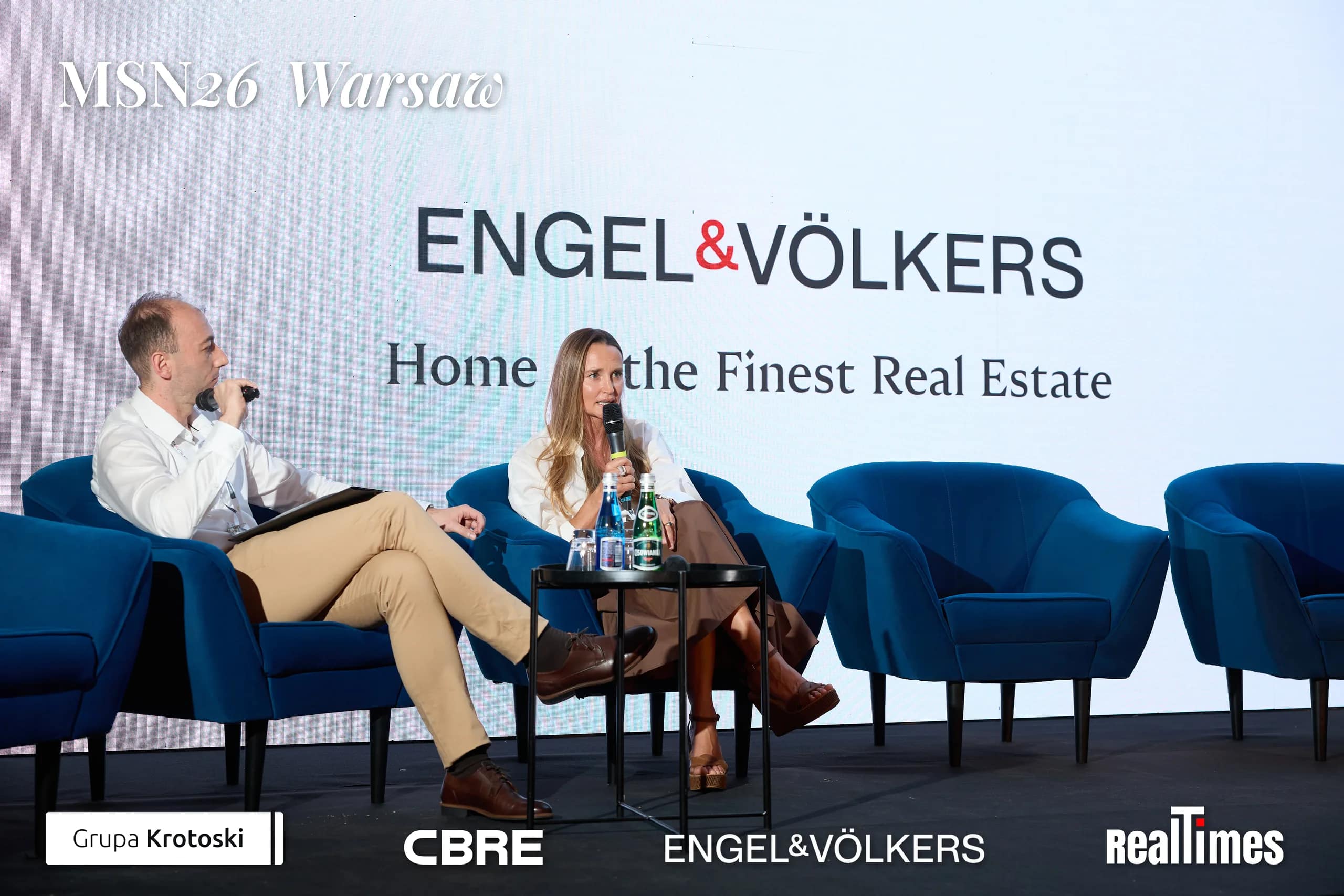 Mid-Summer Night 2026 at B'Fort, Warsaw: Engel&Volkers slide, seated stage talk
