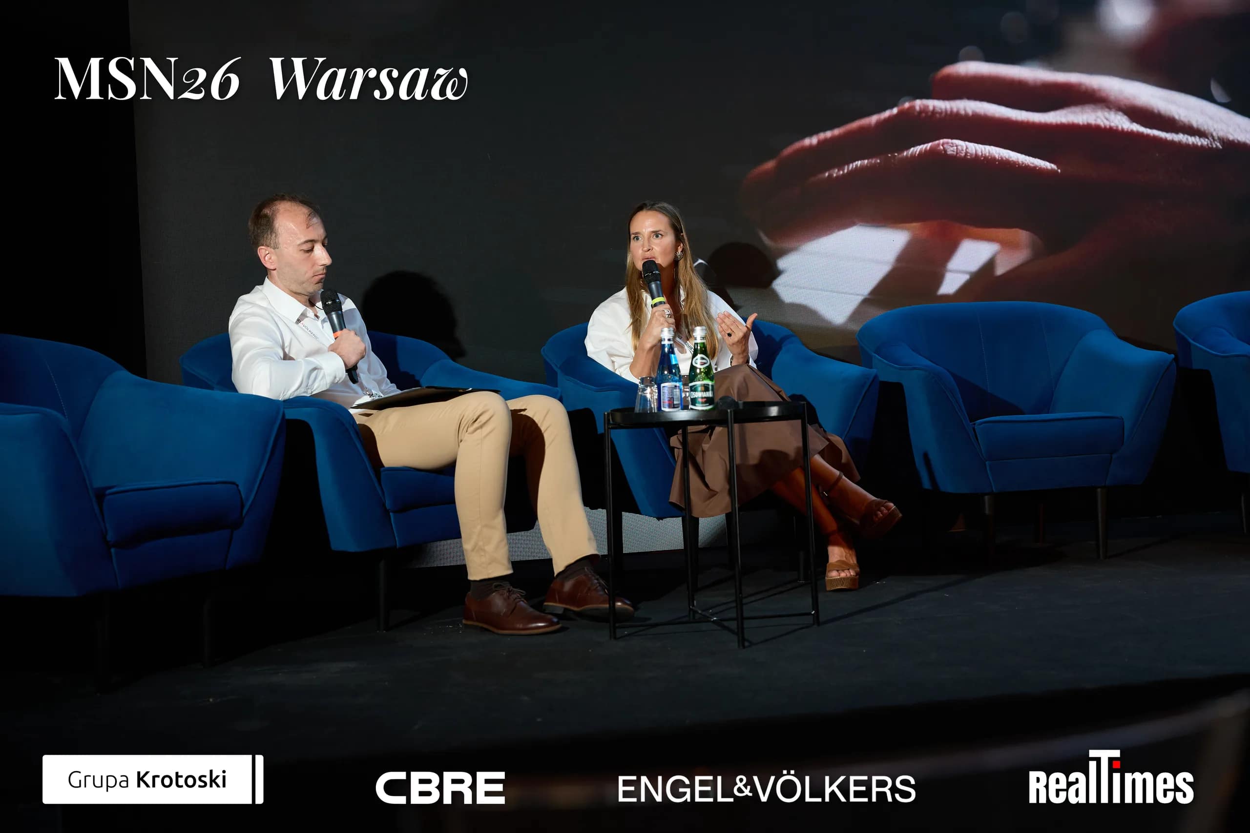 Mid-Summer Night 2026 at B'Fort, Warsaw: seated stage talk, hand piano slide