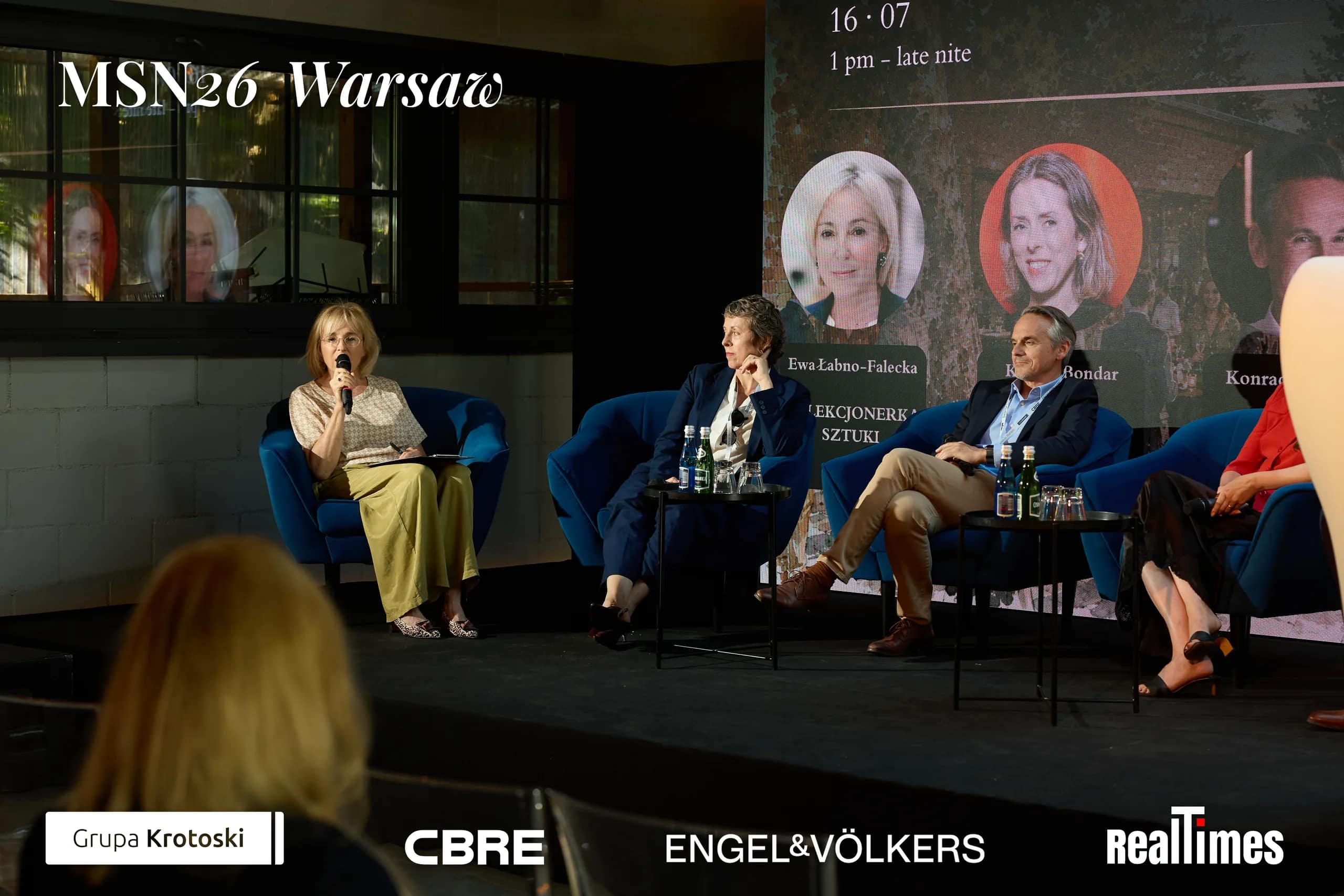 Mid-Summer Night 2026 at B'Fort, Warsaw: row of panelists on stage