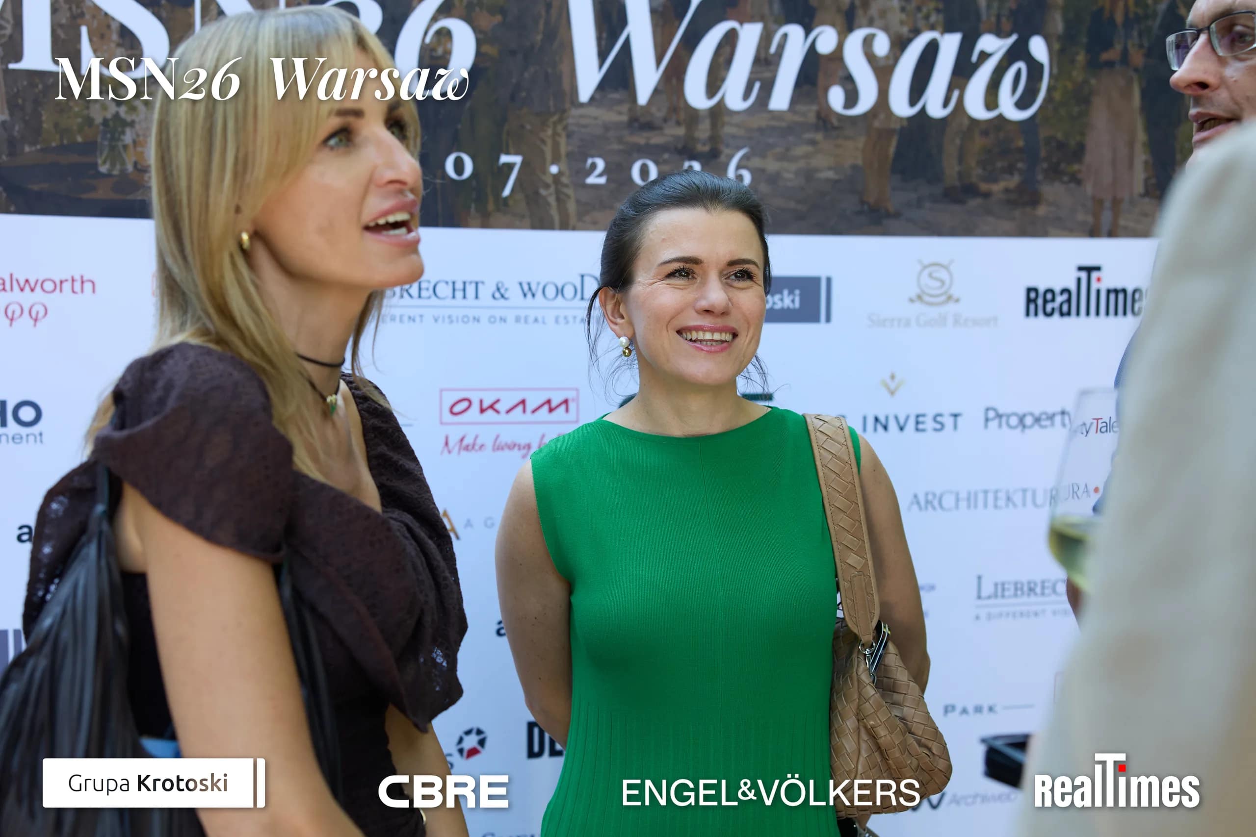 Mid-Summer Night 2026 at B'Fort, Warsaw: women networking near press wall