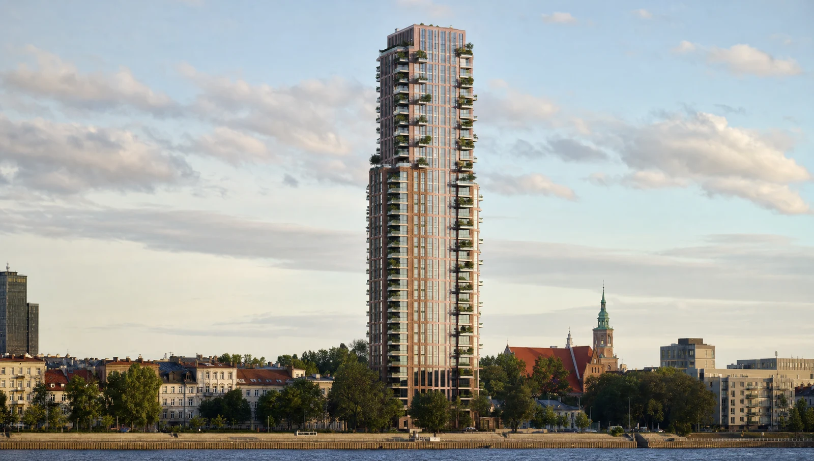 A brick residential tower with planted balconies on a northern European riverside, church spire and low blocks beside it