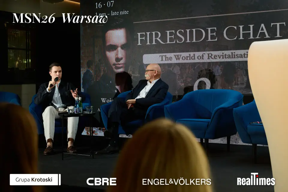 Mid-Summer Night 2026 at B'Fort, Warsaw: Fireside Chat backdrop, host and guest seated