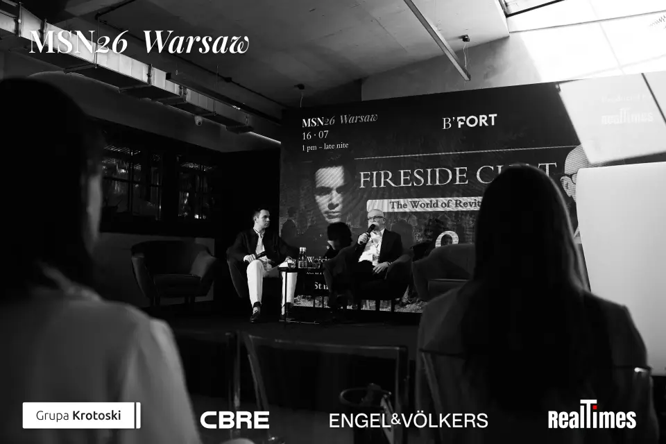 Mid-Summer Night 2026 at B'Fort, Warsaw: Fireside Chat stage, two seated, B&W