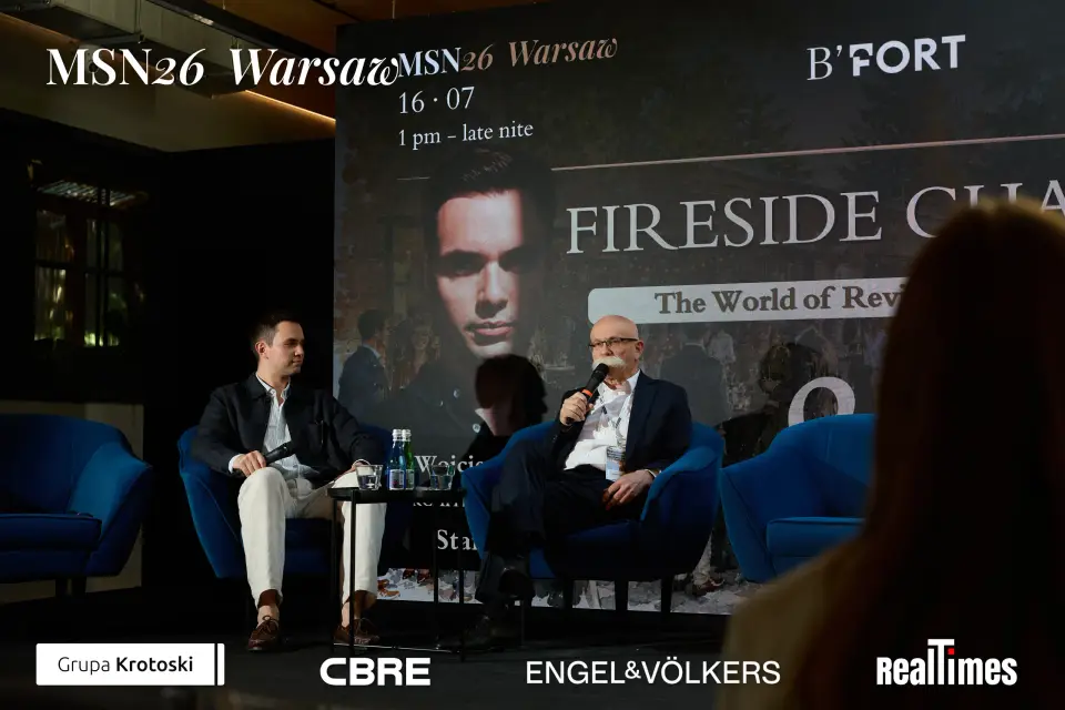 Mid-Summer Night 2026 at B'Fort, Warsaw: Fireside Chat screen, host and guest with mic