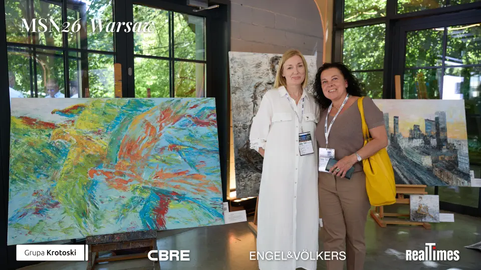 Mid-Summer Night 2026 at B'Fort, Warsaw: two women posing by art paintings