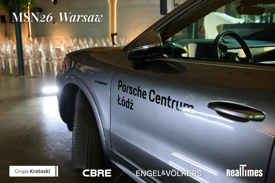 Mid-Summer Night 2026 at B'Fort, Warsaw: Porsche car indoors, empty session chairs