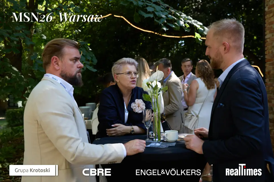 Mid-Summer Night 2026 at B'Fort, Warsaw: garden networking at high table, drinks