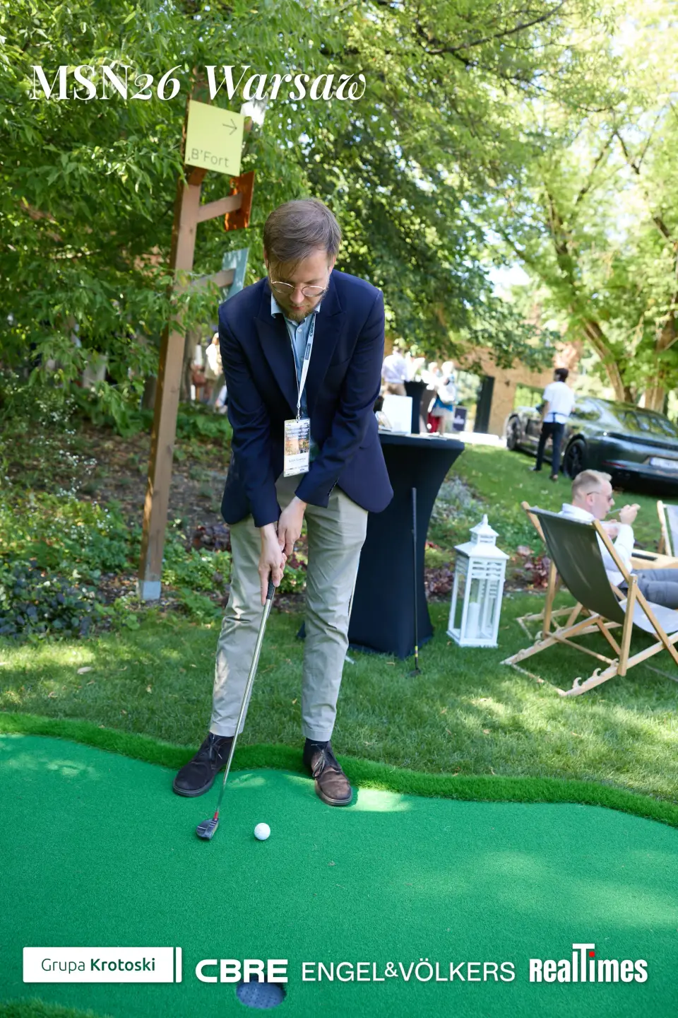 Mid-Summer Night 2026 at B'Fort, Warsaw: man putting on mini-golf activation