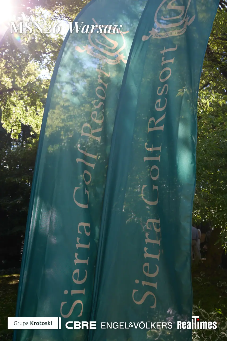 Mid-Summer Night 2026 at B'Fort, Warsaw: Sierra Golf Resort banners in garden