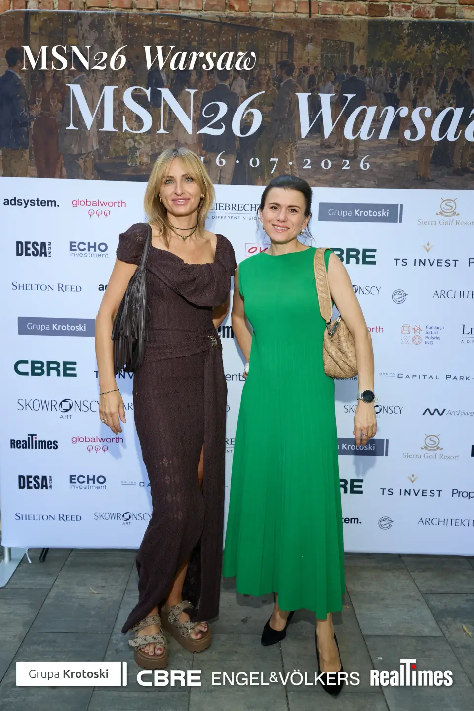 Mid-Summer Night 2026 at B'Fort, Warsaw: two women posing at press wall