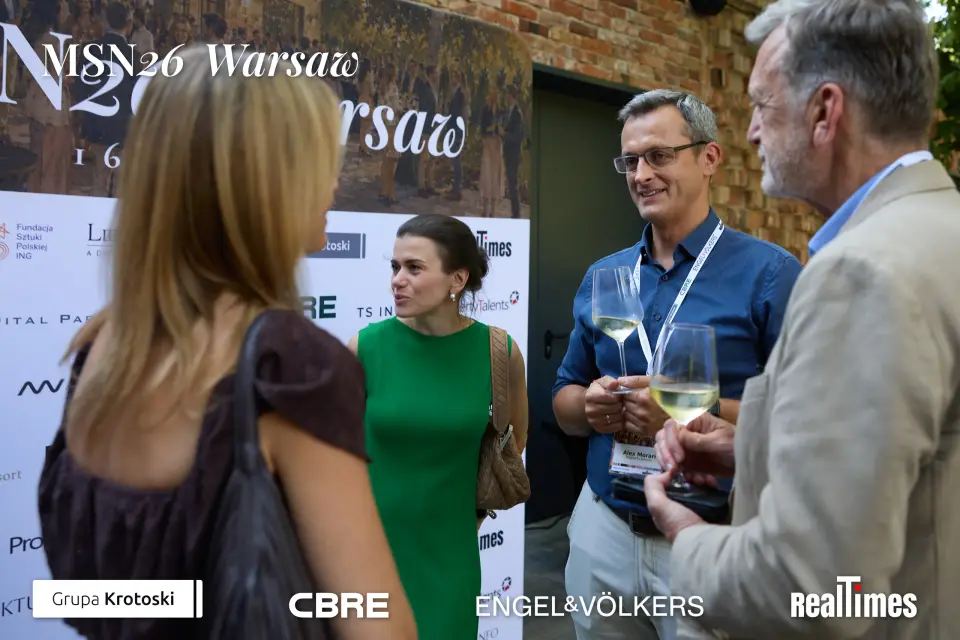 Mid-Summer Night 2026 at B'Fort, Warsaw: networking with wine at press wall