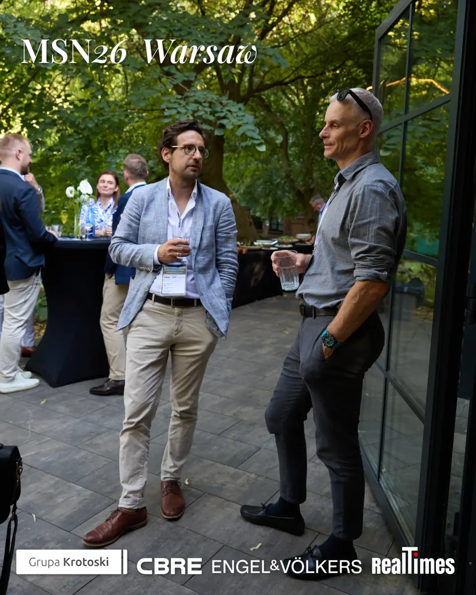 Mid-Summer Night 2026 at B'Fort, Warsaw: two men chatting with drinks on terrace